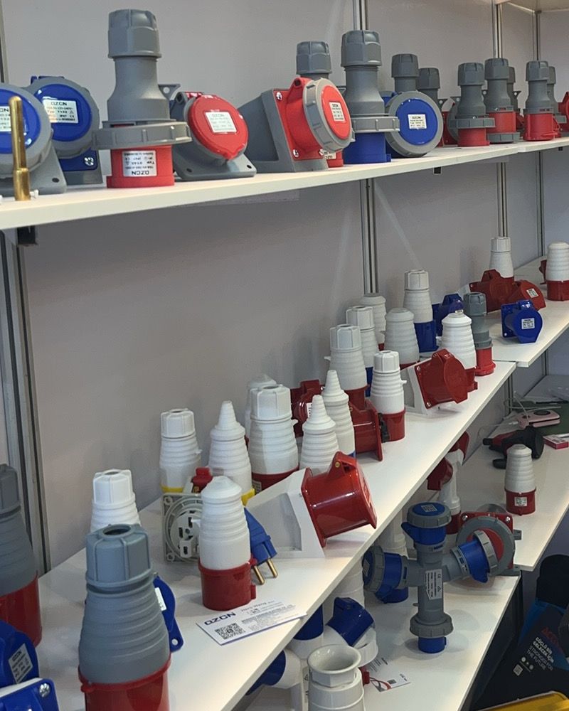 Industrial plugs and sockets on shelves