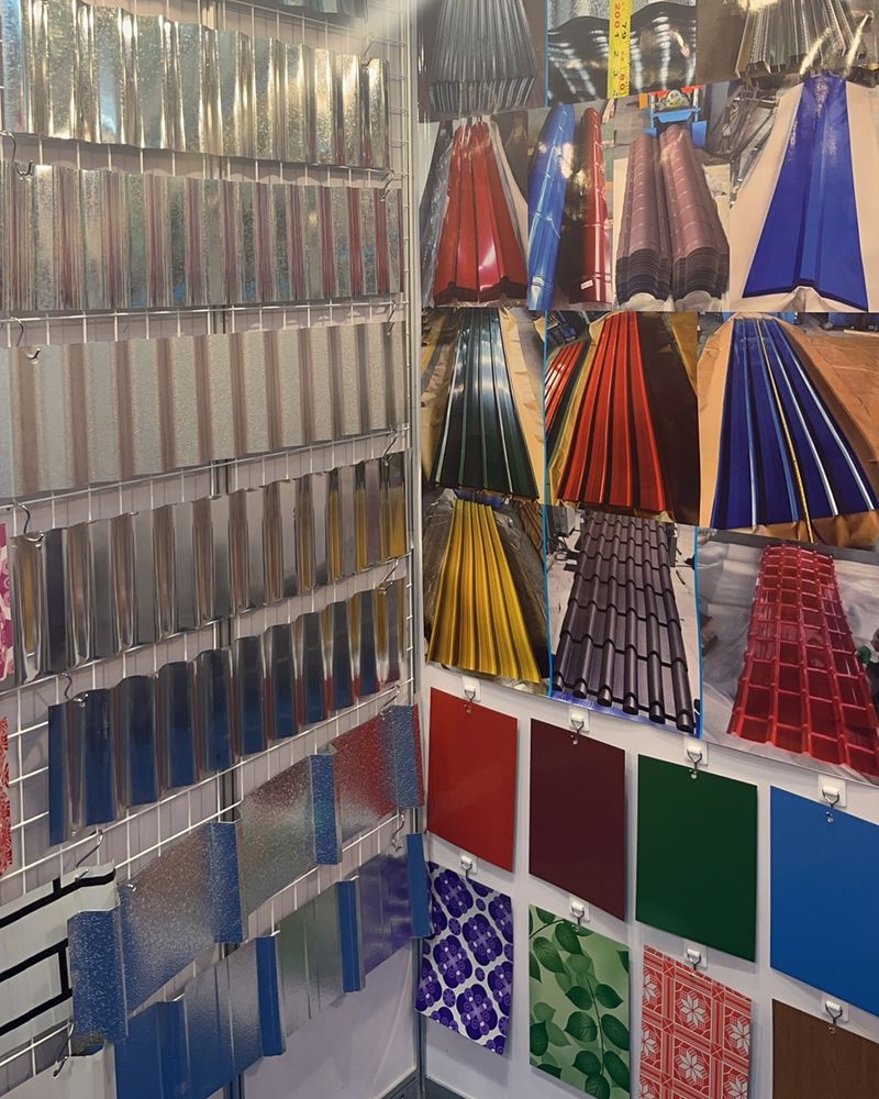 Galvanised and colour-coated roofing sheet samples on a stand at the Canton Fair